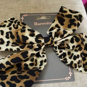 Pink hair barrette and cheetah print barrette